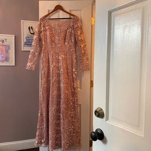 Long sleeve special occasion maxi dress.